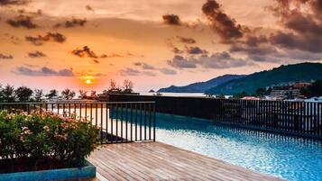 2 outdoor pools, open 7:30 AM to 10:00 PM, pool umbrellas, sun loungers