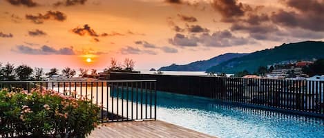 2 outdoor pools, open 7:30 AM to 10:00 PM, pool umbrellas, sun loungers