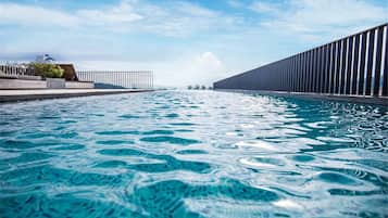 2 outdoor pools, open 7:30 AM to 10:00 PM, pool umbrellas, sun loungers