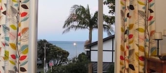 Miner's Cottage by Cable Bay