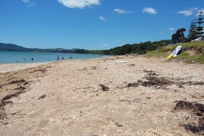 Miner's Cottage by Cable Bay