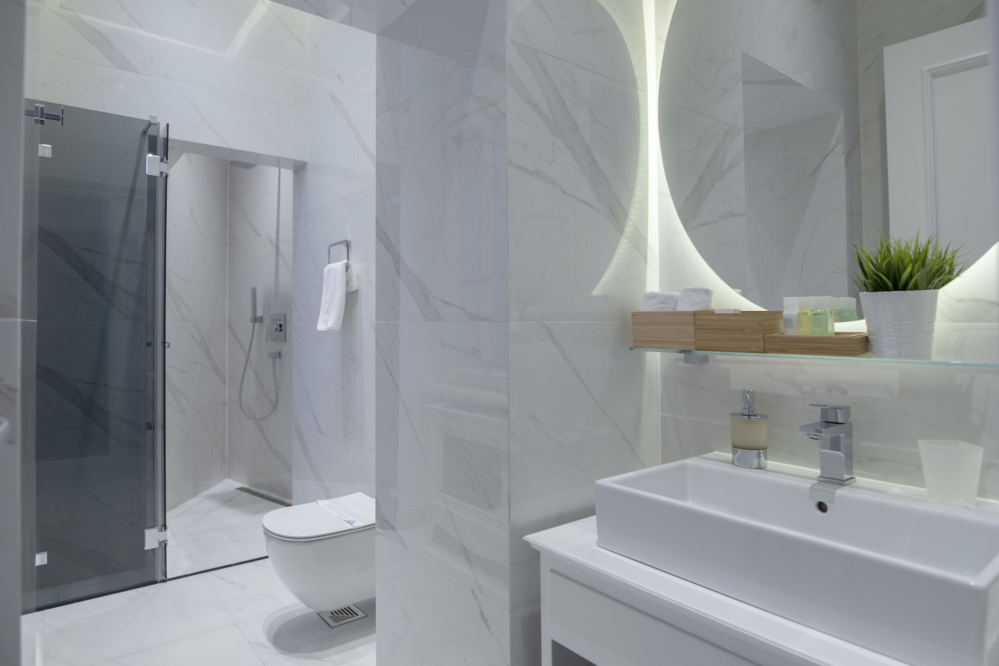 family room | bathroom | shower, rainfall showerhead, free toiletries, hair dryer