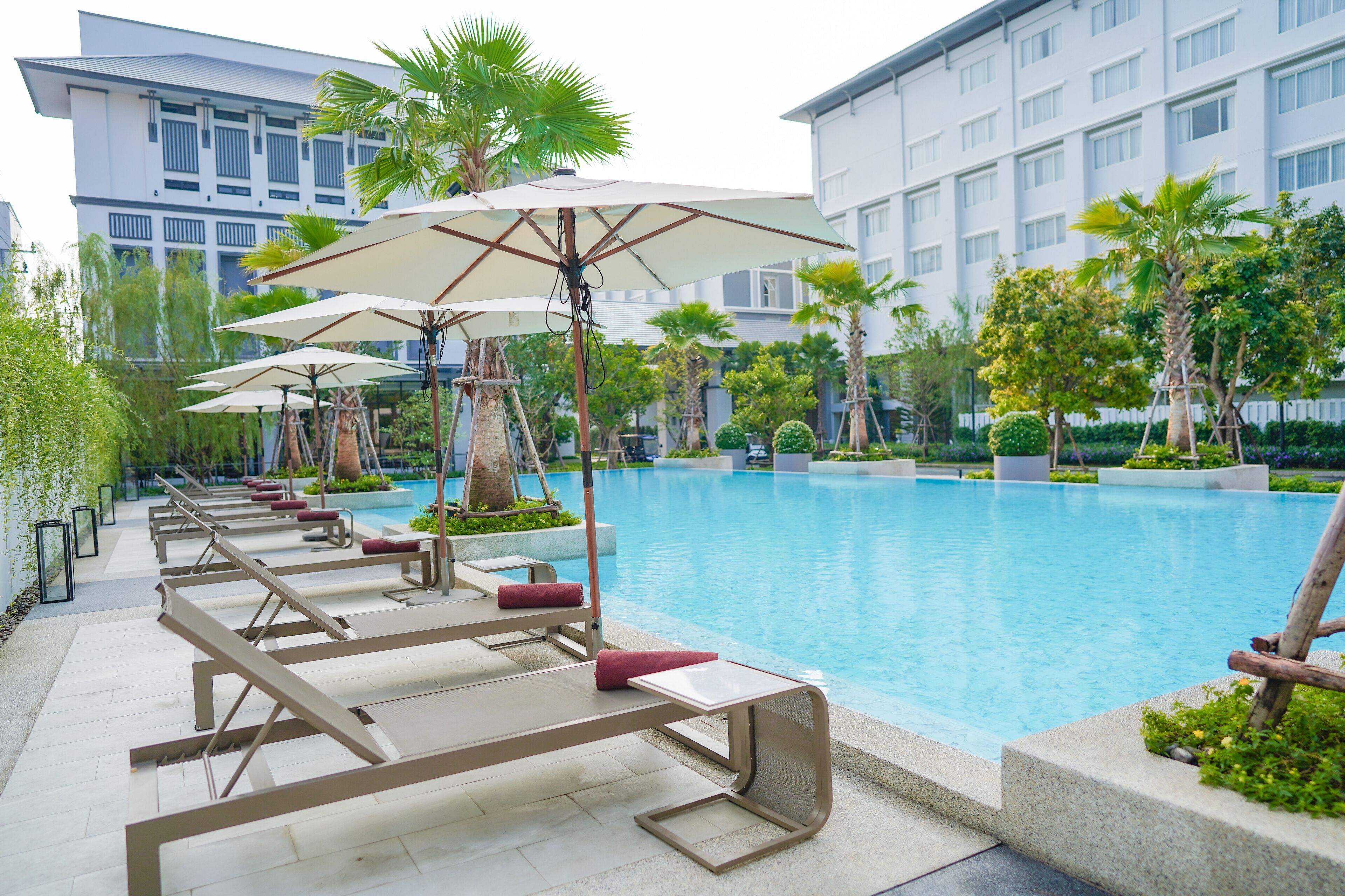 2 outdoor pools, pool umbrellas, pool loungers