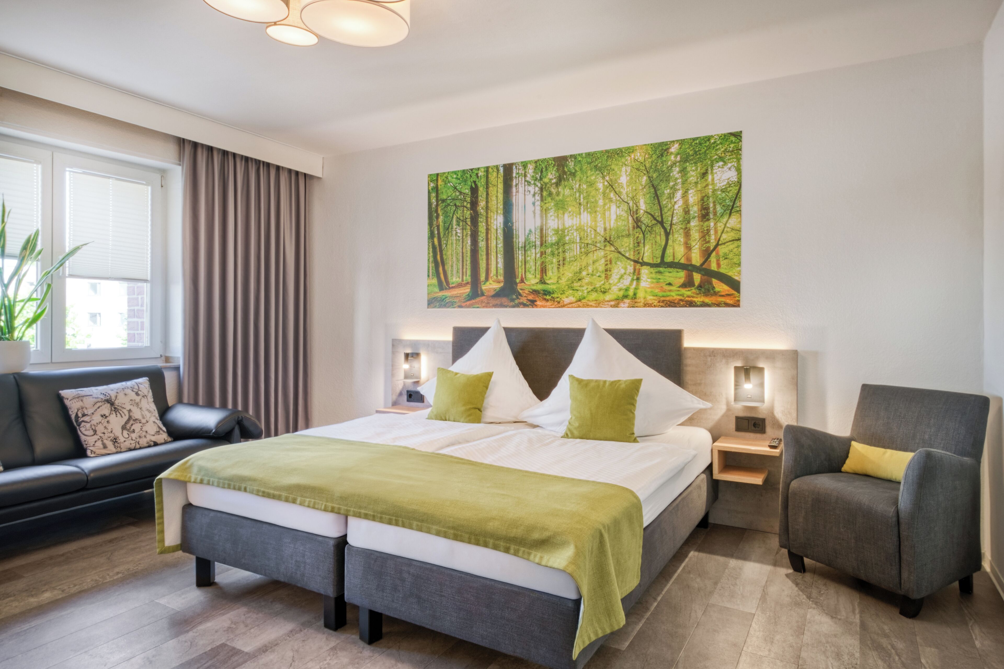 Twin kamer | Woonruimte | Een 40-inch flatscreentelevisie met digitale zenders