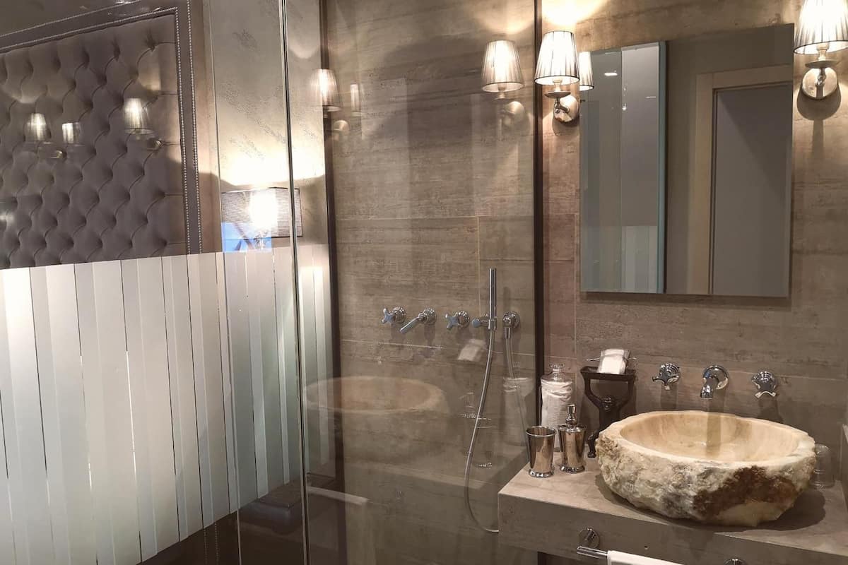 shower, free toiletries, hair dryer, slippers