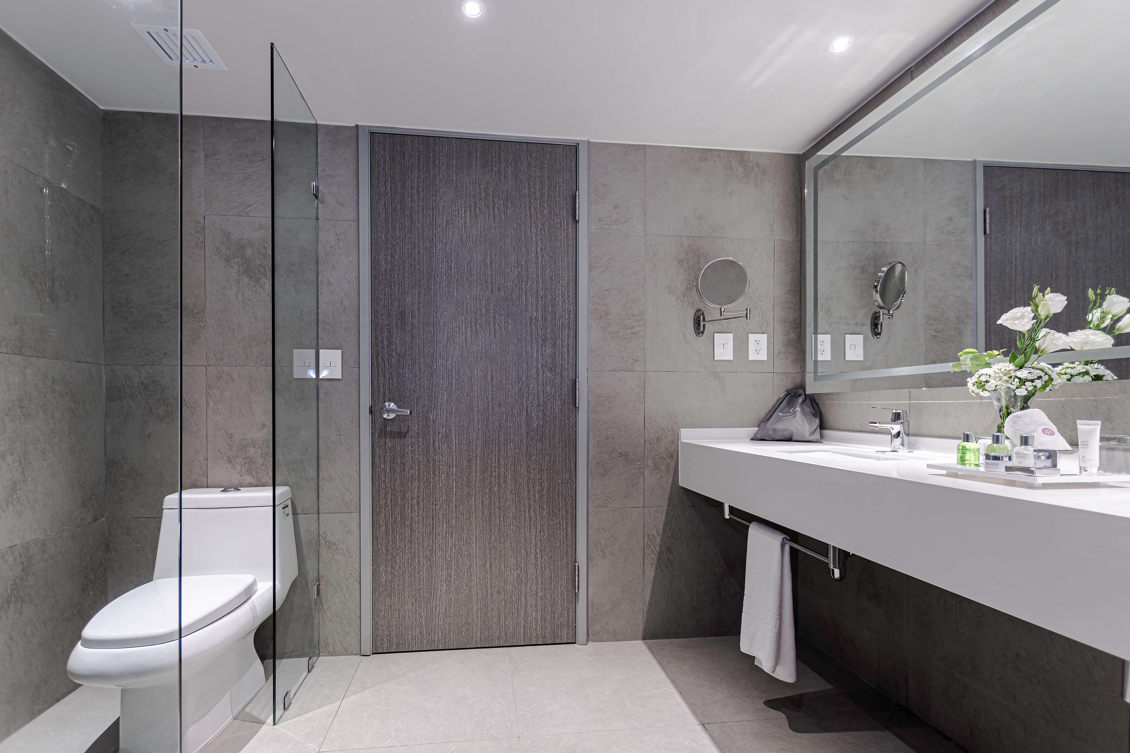 eco-friendly toiletries, hair dryer, towels, soap