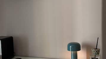 Comfort Triple Room | Living area | Flat-screen TV