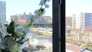 Chambre Triple Deluxe, 1 grand lit | Vue sur la ville