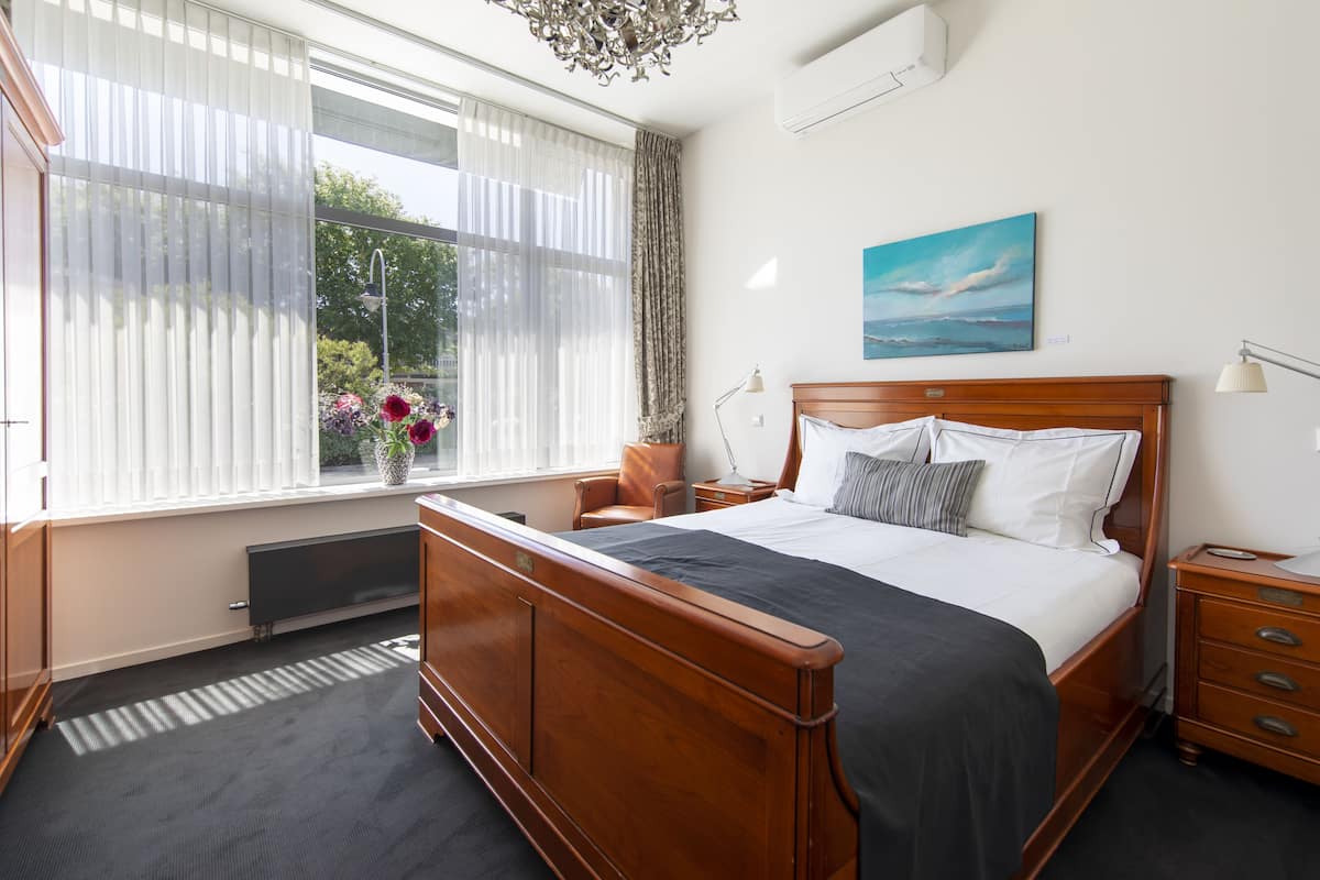 Deluxe Double Room, 1 Queen Bed | In-room safe, blackout drapes, iron/ironing board (on request)