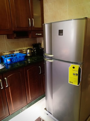 Apartamento, 2 quartos, para não fumantes | Cozinha compartilhada | Geladeira, micro-ondas, fogão, cooktop