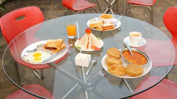 Daily buffet breakfast (INR 250 per person)