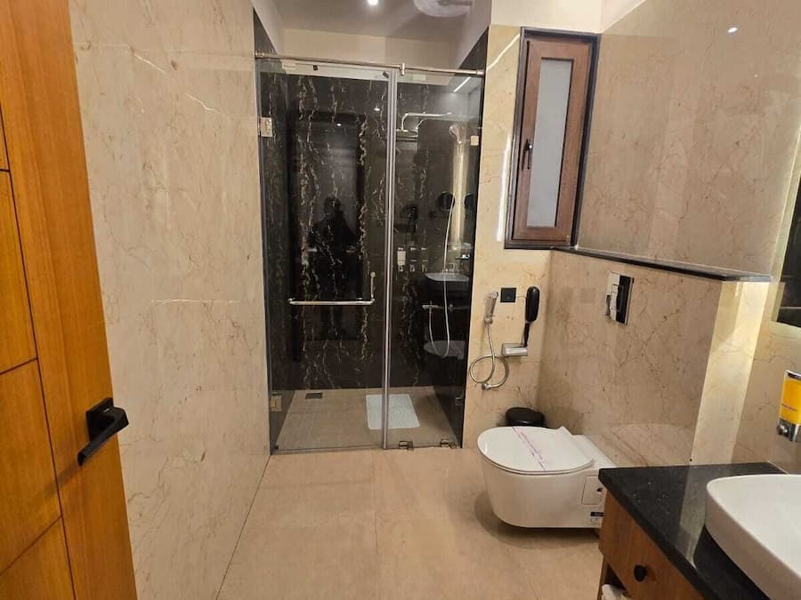 Habitación ejecutiva | Baño | Ducha y cabezal de ducha tipo lluvia