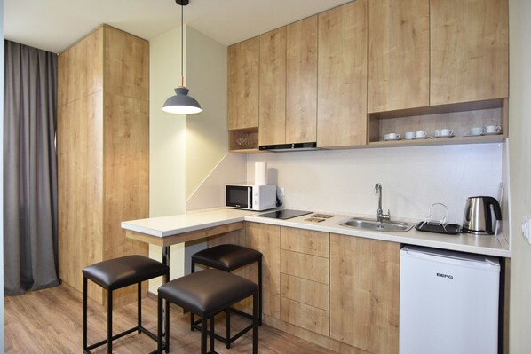 Apartment, 1 Schlafzimmer | Eigene Küche | Kühlschrank, Mikrowelle, Ofen, Herdplatte