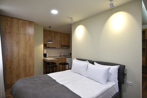 Apartment, 1 Schlafzimmer | Schreibtisch, Bügeleisen/Bügelbrett, kostenloses WLAN, Bettwäsche