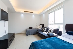 Apartamento de lujo, varias camas, no fumadores | Tabla de planchar con plancha, cunas (de pago), wifi gratis