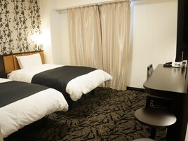 Deluxe Twin Room, Non Smoking | Down comforters, desk, blackout drapes, free WiFi