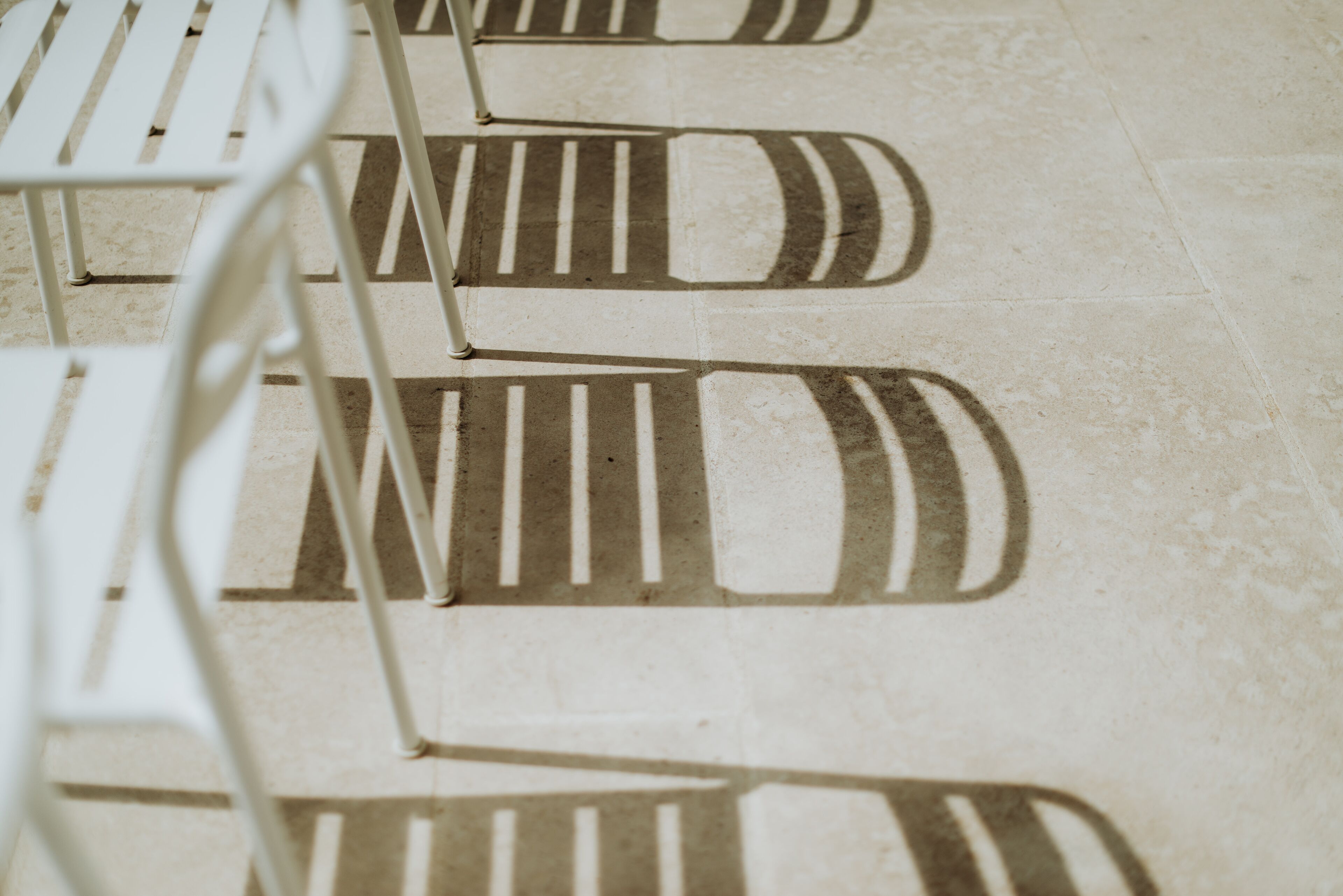 A close-up of a tiled floor with a geometric pattern.