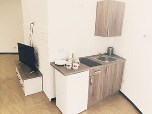 Familien-Studiosuite, 1 Schlafzimmer | Bügeleisen/Bügelbrett, kostenloses WLAN, Bettwäsche, Rollstuhlgeeignet