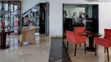 Minibar, desk, laptop workspace, iron/ironing board
