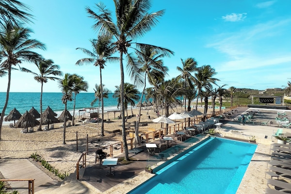 2 outdoor pools, pool umbrellas, sun loungers