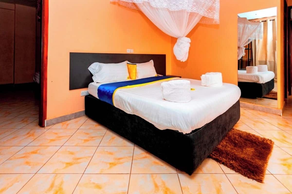 Family Room | Premium bedding, memory foam beds, desk, laptop workspace