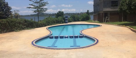 Outdoor pool, pool umbrellas, sun loungers