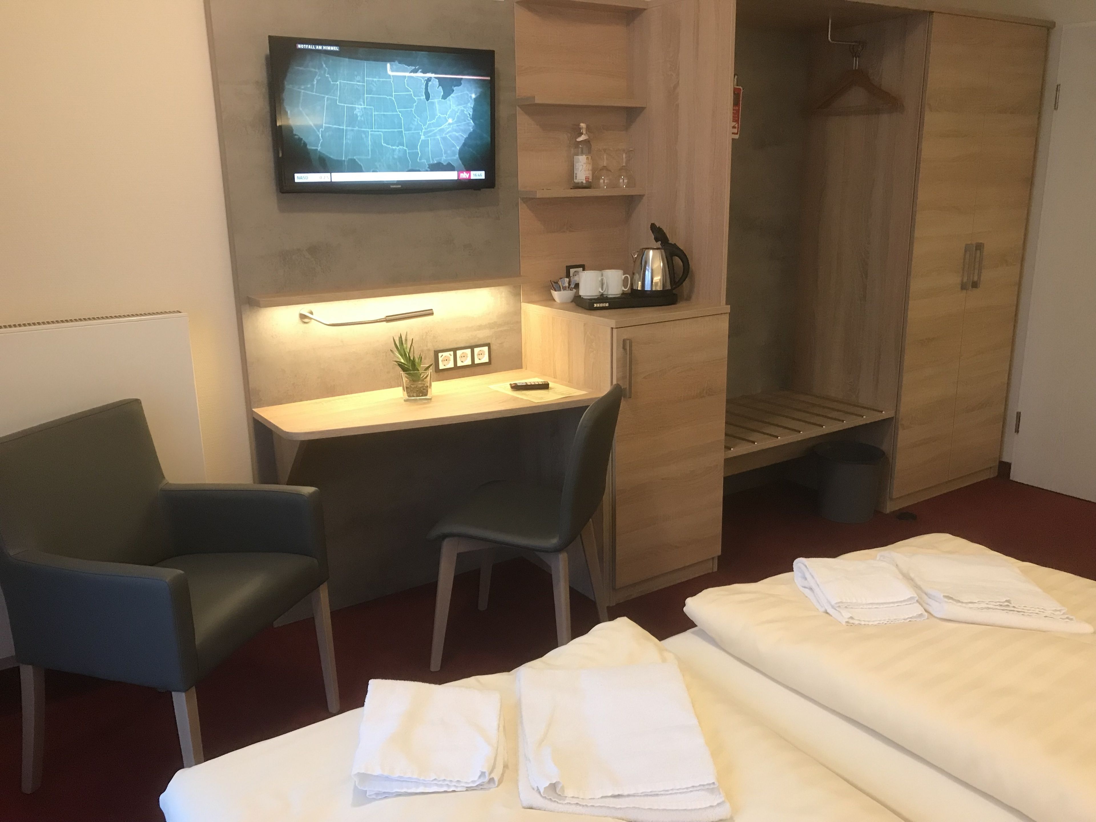 hypo-allergenic bedding, in-room safe, desk, blackout curtains