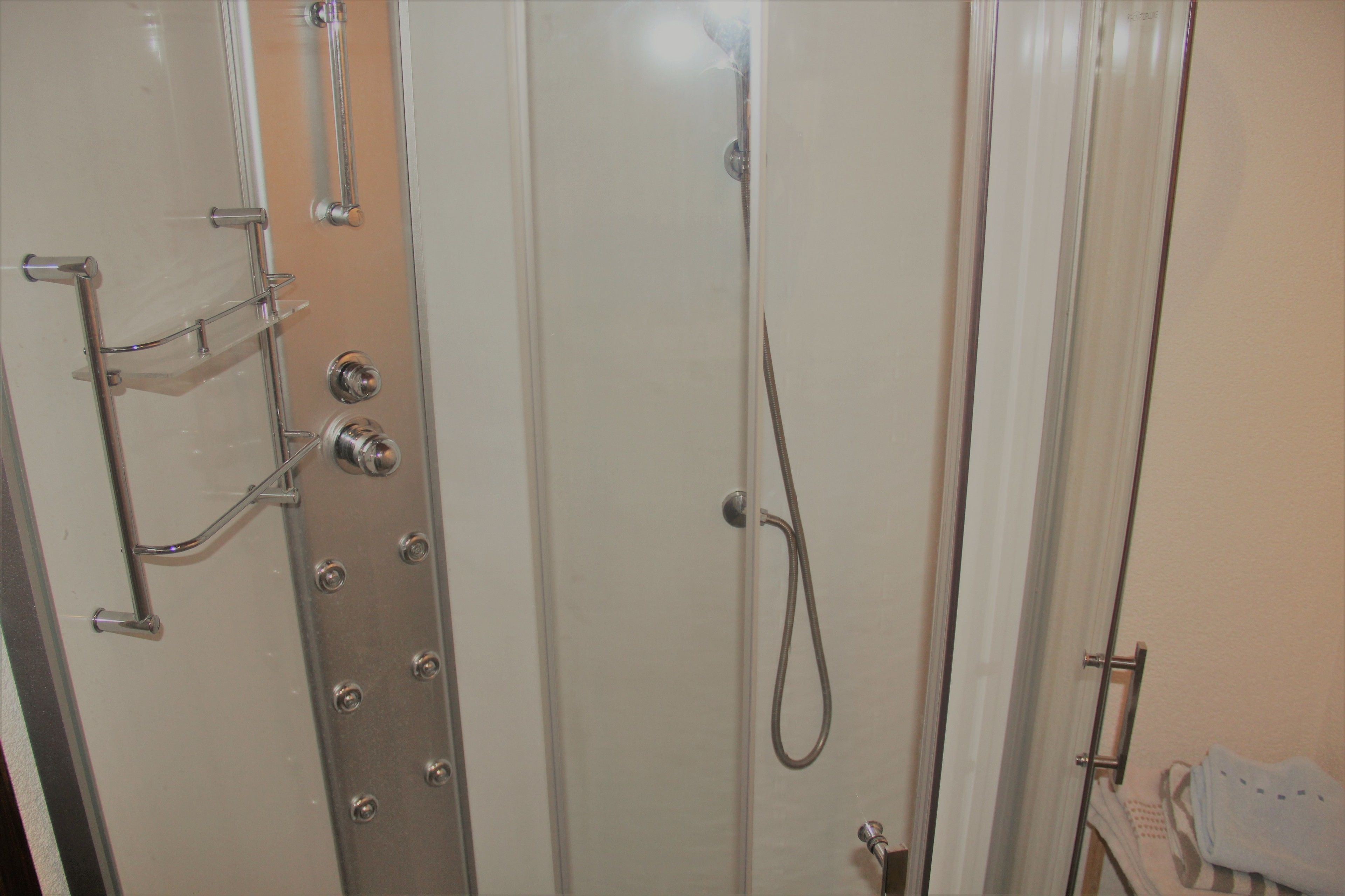 Shower, free toiletries, hair dryer, towels