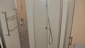 Shower, free toiletries, hair dryer, towels