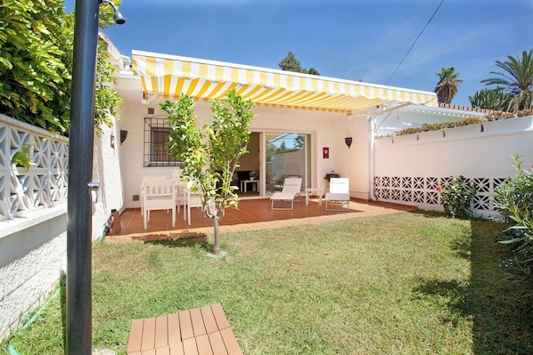 Unclassified image, 1 of 13, button - Beachside small house with garden (Marbella)
