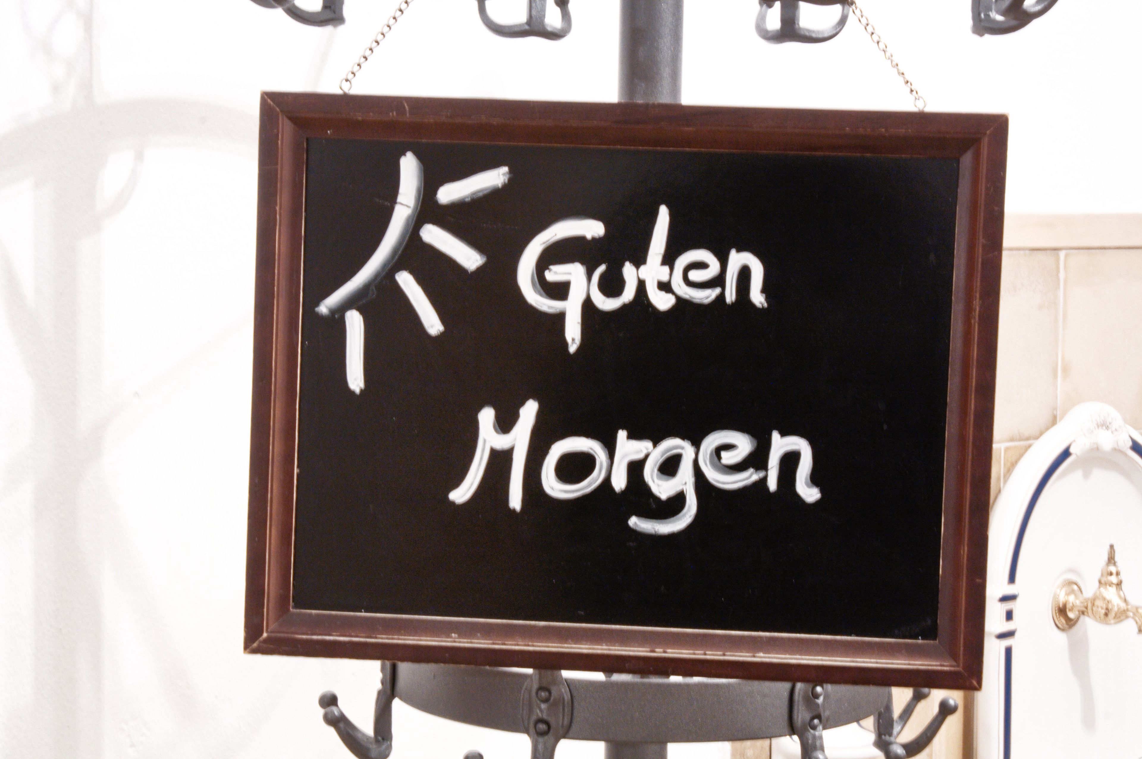 A blackboard with the words "Guten Morgen" written on it.