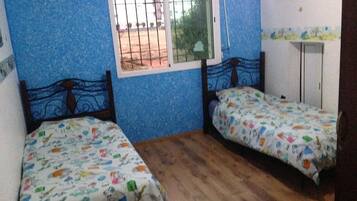 Apartment, 2 Bedrooms | 2 bedrooms, blackout drapes, iron/ironing board, bed sheets