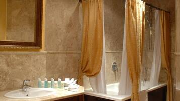 Bathtub, free toiletries, hair dryer, bathrobes