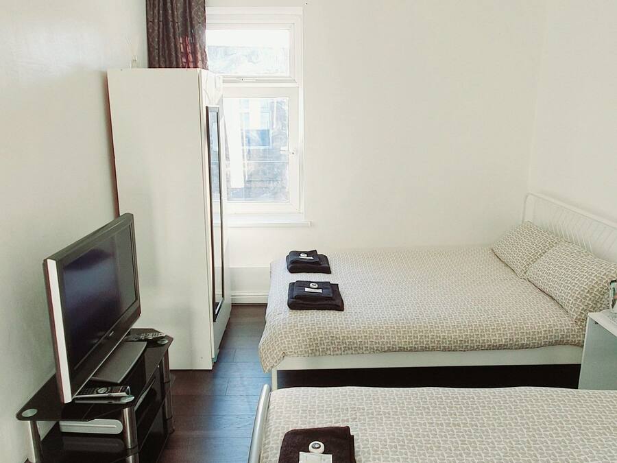 Deluxe King Ensuite | Een bureau, een strijkplank/strijkijzer, gratis wifi, beddengoed