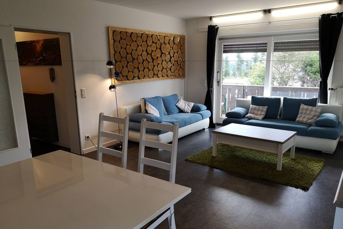 Comfort Apartment, 1 Bedroom | Living room | Flat-screen TV