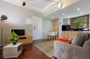 Superior Apartment | Living area | Flat-screen TV
