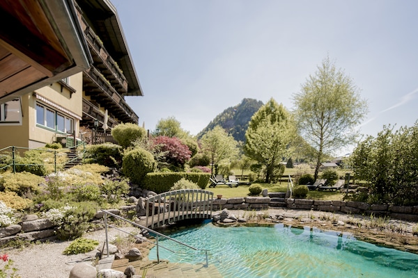 Seasonal outdoor pool, pool loungers