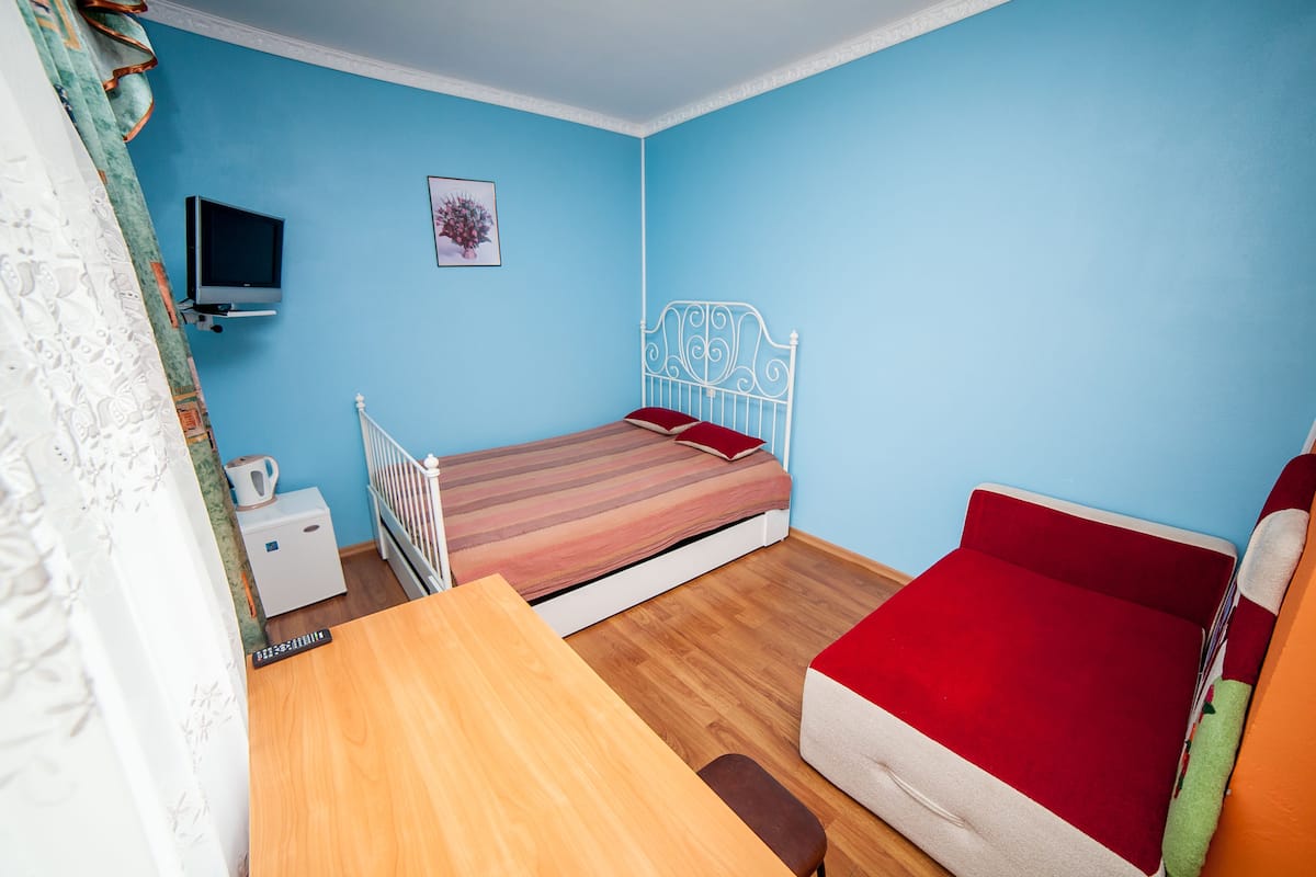 Tweepersoonskamer, balkon | 1 slaapkamer, verduisterende gordijnen, een strijkplank/strijkijzer