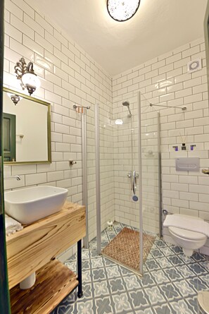 Shower, free toiletries, hair dryer, slippers