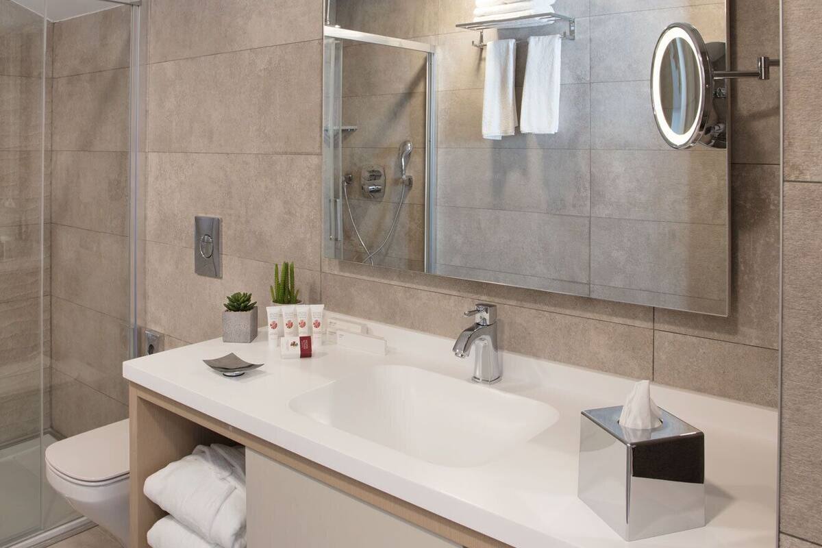 suite, 1 king bed, non smoking | bathroom sink