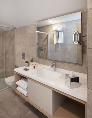 Suite, 1 cama de matrimonio grande, no fumadores | Lavabo del cuarto de baño
