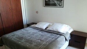 Appartement Confort, 2 chambres | 2 chambres, rideaux d’obscurcissement, lit d’appoint (supplément)