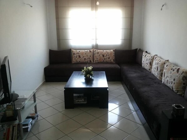 Comfort Apartment, 2 Bedrooms | Living room | 32-inch flat-screen TV with satellite channels, TV - Dream house (Rabat)