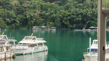 Quadruple Room, Lake View | Blackout drapes, free WiFi, bed sheets