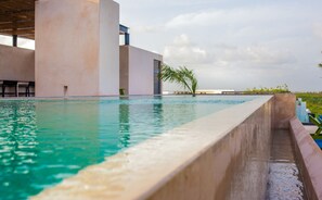 Outdoor pool - Stunning Design 2BR Condo in exclusive location by Happy Address (Playa del Carmen)