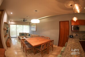 Apartment, 3 Bedrooms | Living area | Flat-screen TV - Fabulous 3BR Condo steps away from 5th Avenue and beach by Happy Adddress (Playa del Carmen)