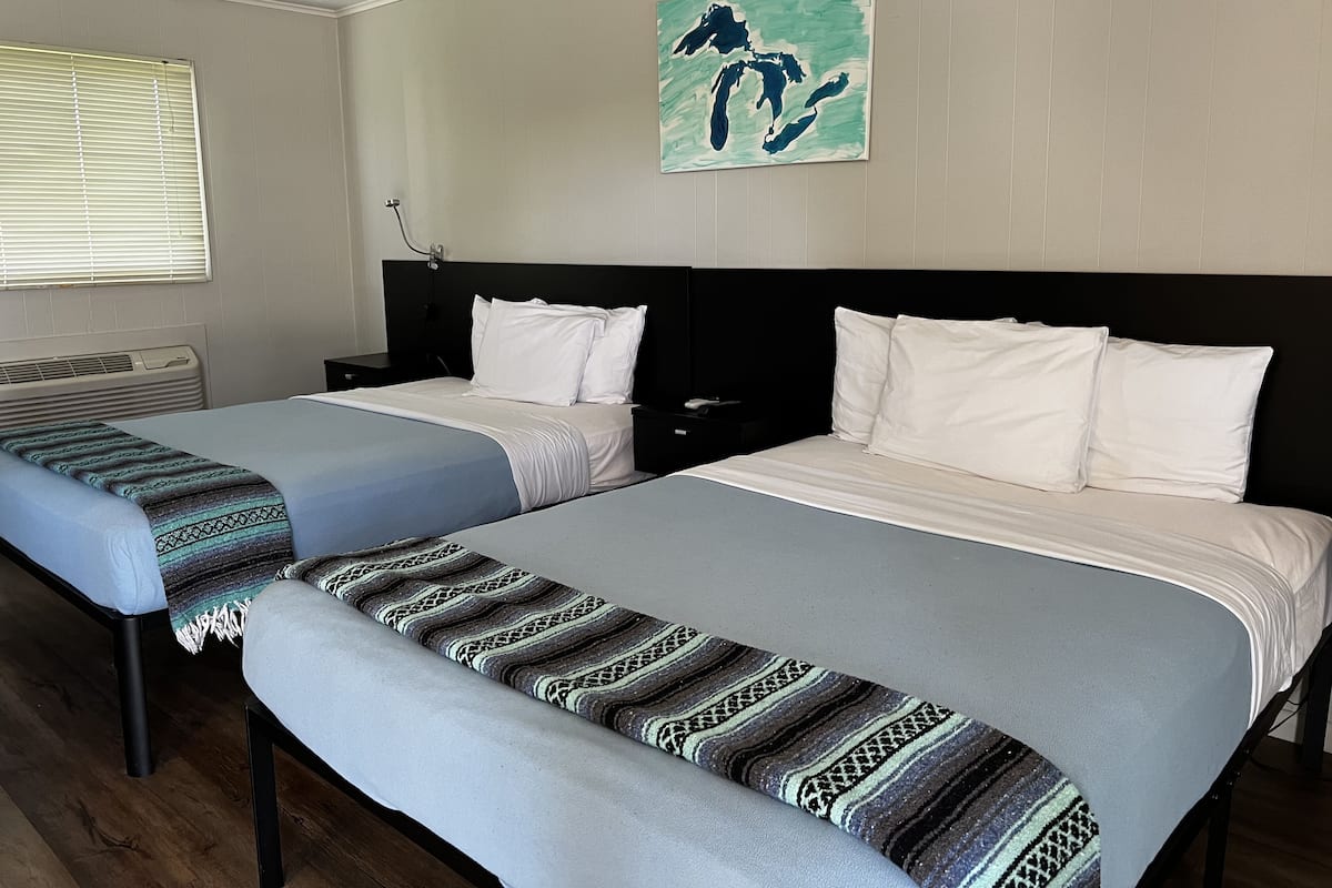 Comfort Room, 2 Queen Beds, Non Smoking | Individually decorated, individually furnished, blackout drapes