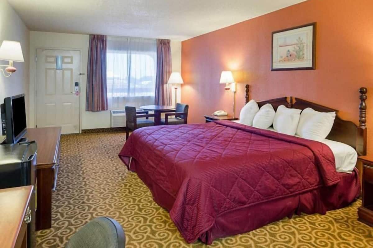 Desk, laptop workspace, blackout curtains, soundproofing