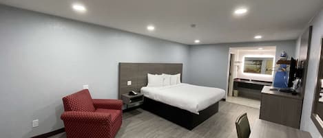 Chambre Standard, 1 trÚs grand lit, non-fumeur, réfrigérateur et four à micro-ondes