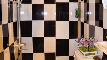 Shower, free toiletries, hair dryer, slippers